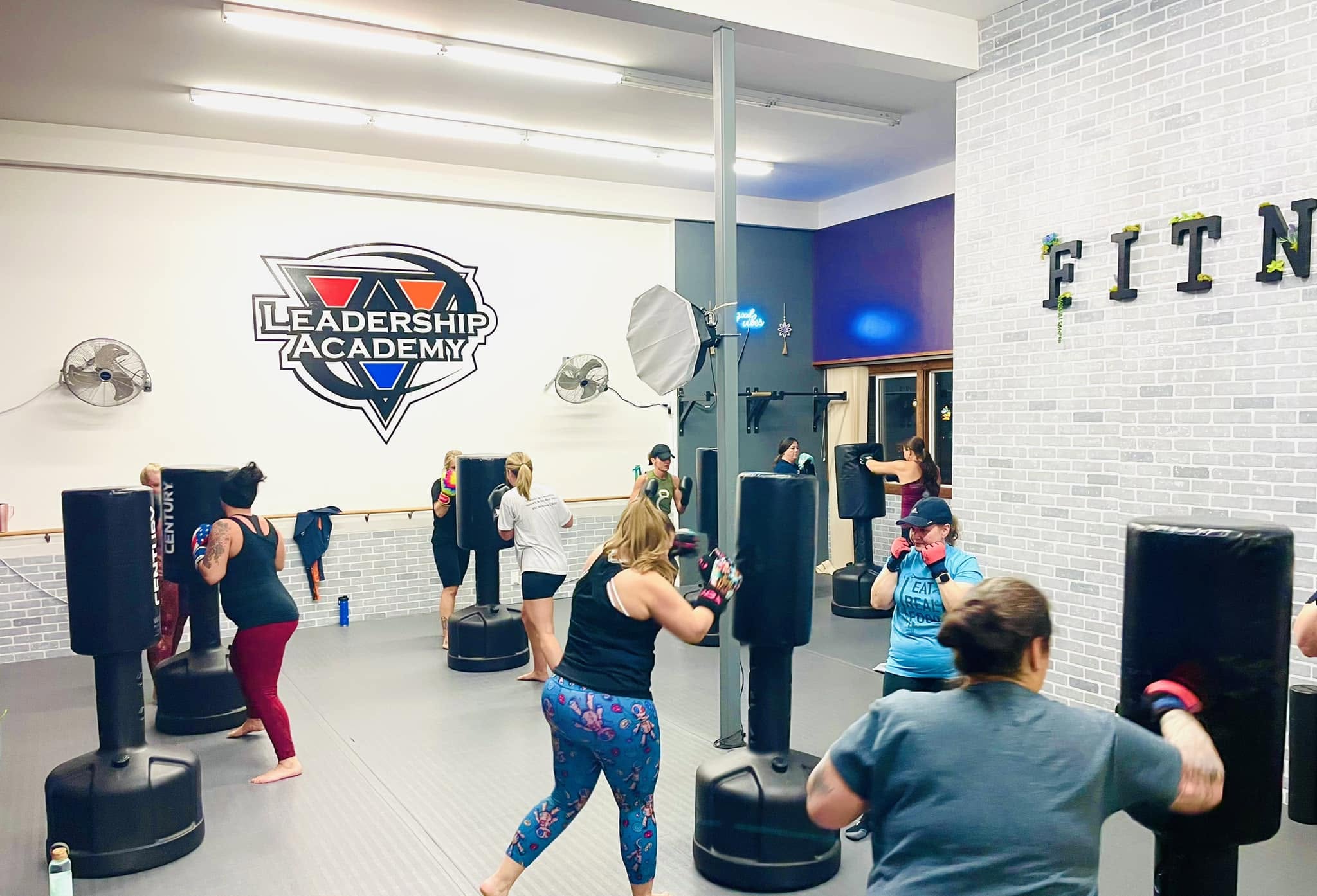 Women's kickboxing class at Leadership Academy
