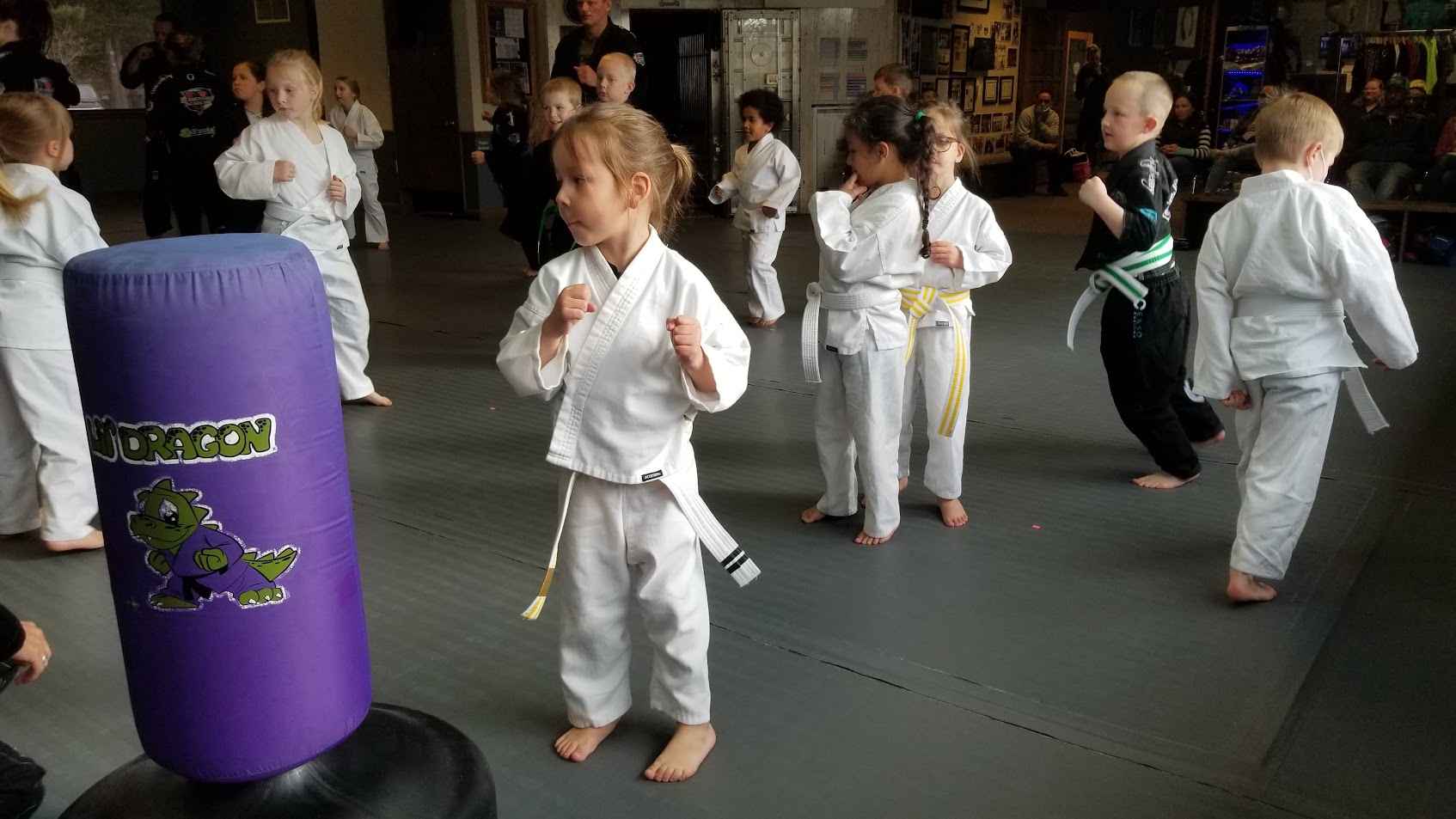 Lil Dragons students lining up for purple bag drills