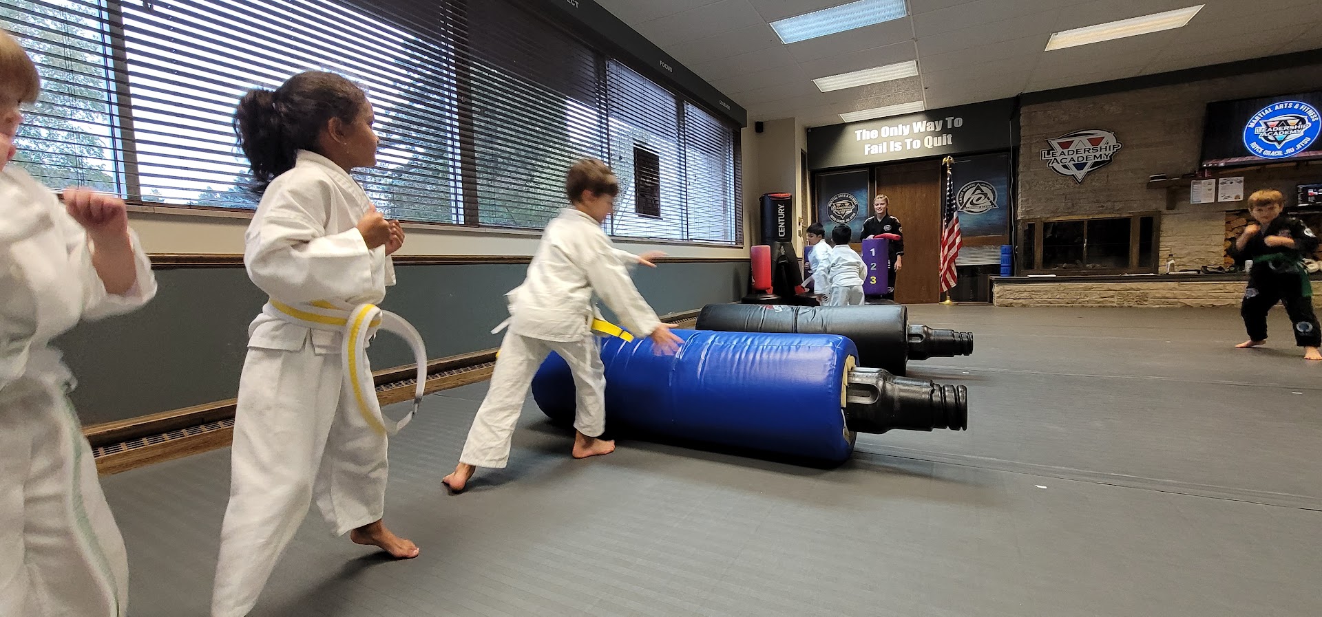 Lil Dragons students practicing an obstacle drill in class