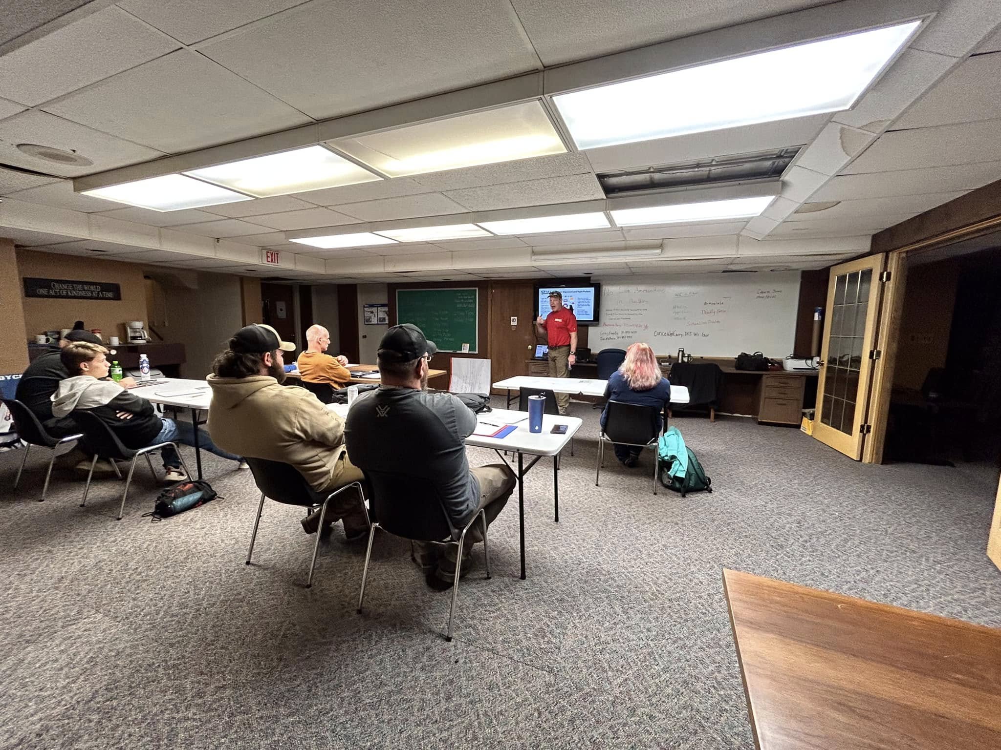 Tom Ahlborn teaching a tactical classroom training session